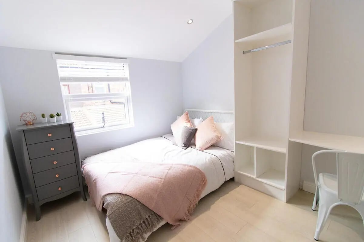 Bed desk wardrobe and dresser bedroom at 6 Bedroom House at 85, Halsbury Road in Liverpool Student Accommodation