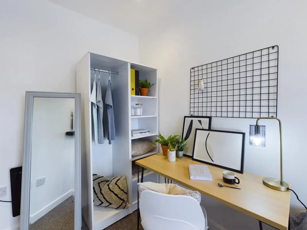 Wardrobe desk mirror and chair study area at 8 Bedroom House at 4, Ossory Street in Manchester Student Accommodation