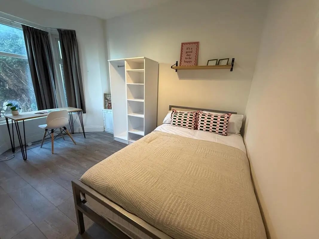 Bed desk wardrobe shelf and pillows bedroom at 4 Bedroom House at 16, Lovat Road in Preston Student Accommodation