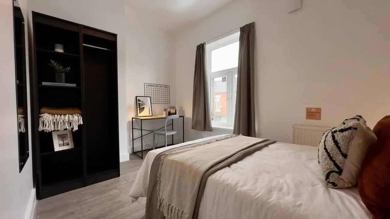 Bed desk wardrobe with shelves and blanket Bedroom at 3 Bedroom House at 25, Romney Street in Salford Student Accommodation