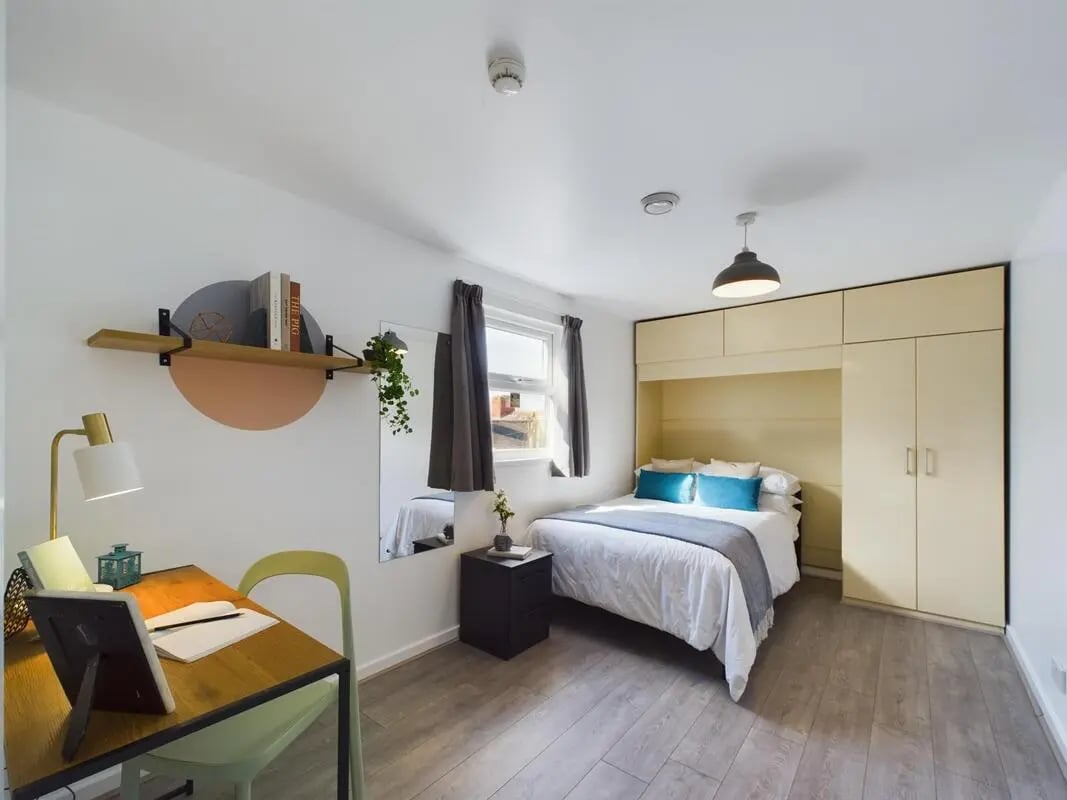Bed desk mirror wardrobe bedroom at 6 Bedroom House at 174, ACOMB STREET in Manchester Student Accommodation