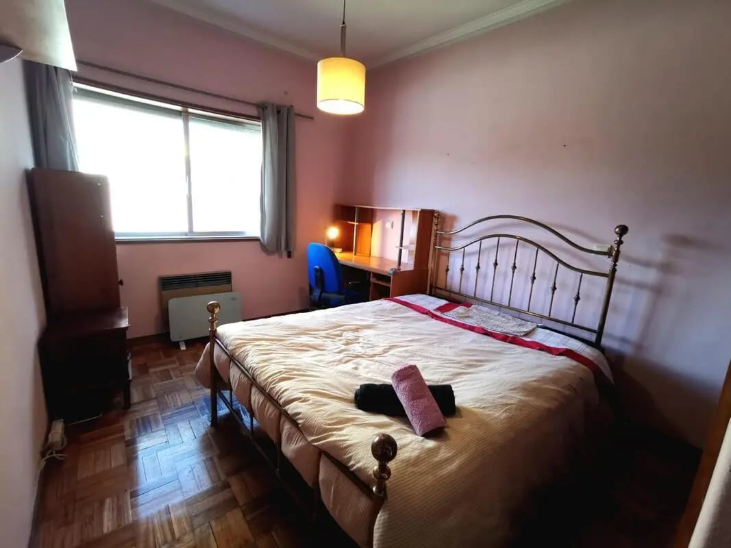 Bed heater desk chair and dresser bedroom at Double Bedroom close to Minho University 8 in Guimaraes Student Accommodation