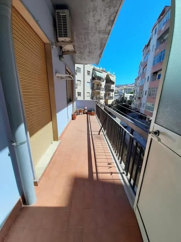 Terracotta tiled balcony air conditioner plants exterior at Comfy single bedroom near Università degli Studi Mediterranea di Reggio Calabria in Reggio Calabria Student Accommodation