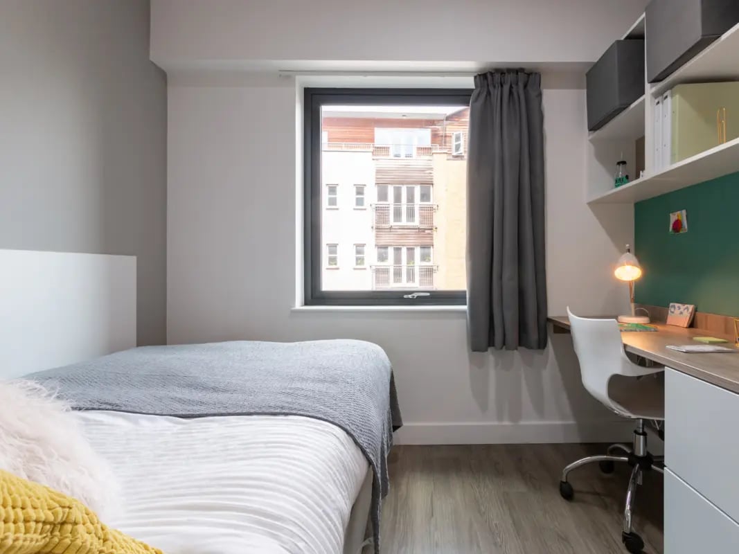 Bed desk with lamp and shelves bedroom at AXO Kingston in Kingston Upon Thames Student Accommodation
