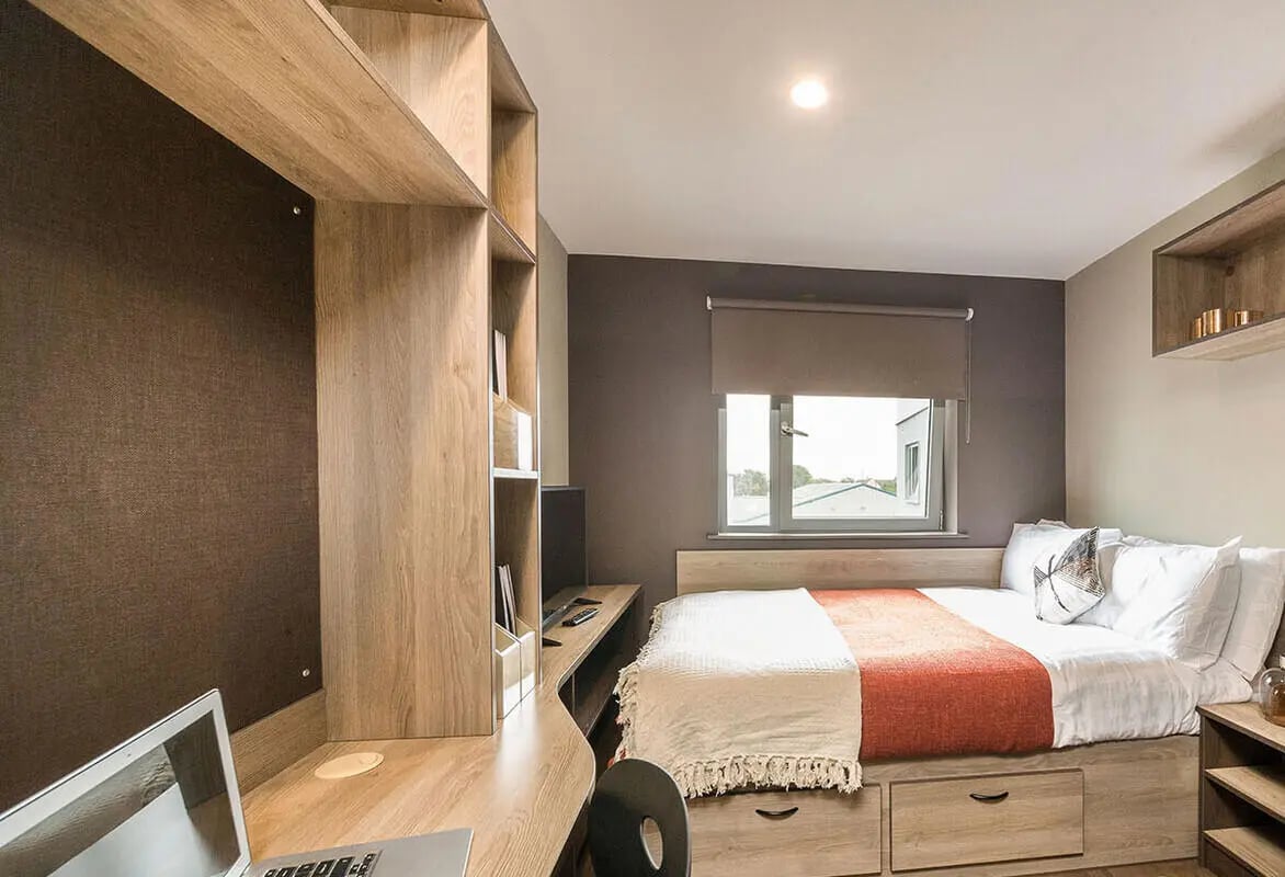 Bed desk shelving and window bedroom at Ernest Place in Durham Student Accommodation