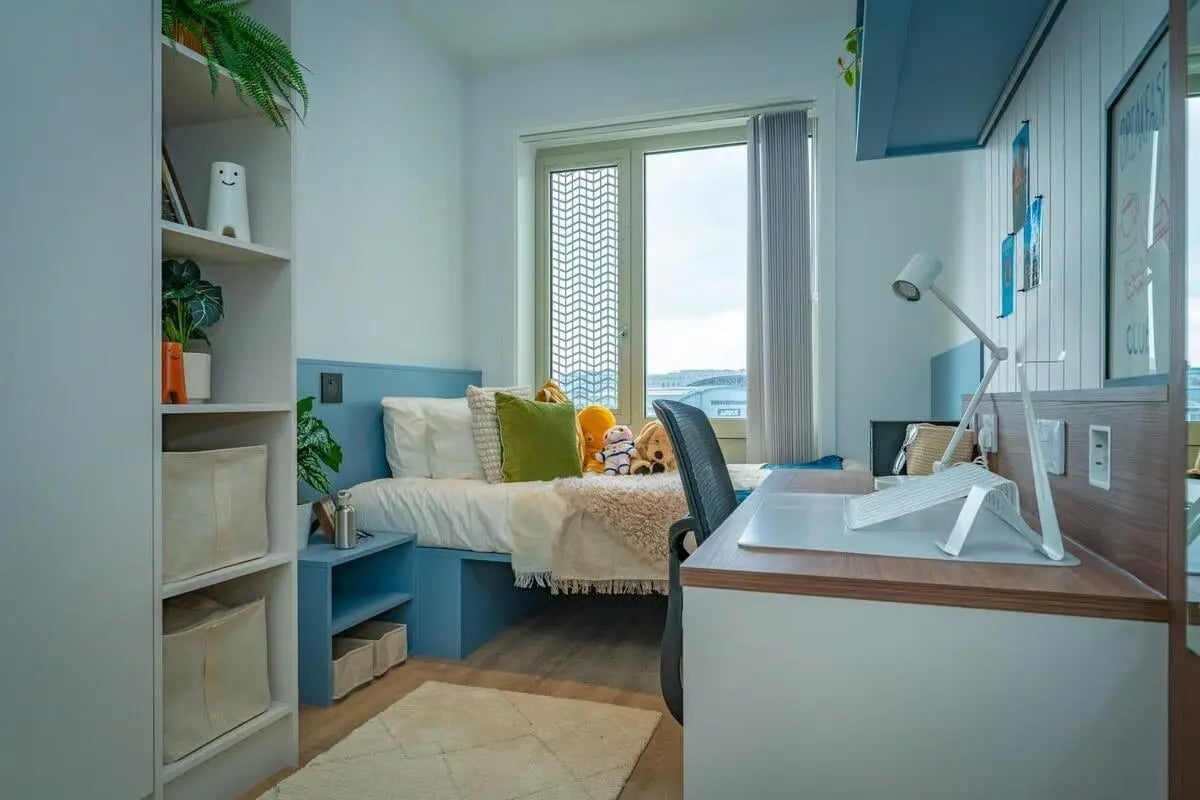 Bed desk and shelves student bedroom at The Propeller Quarter in Bristol Student Accommodation