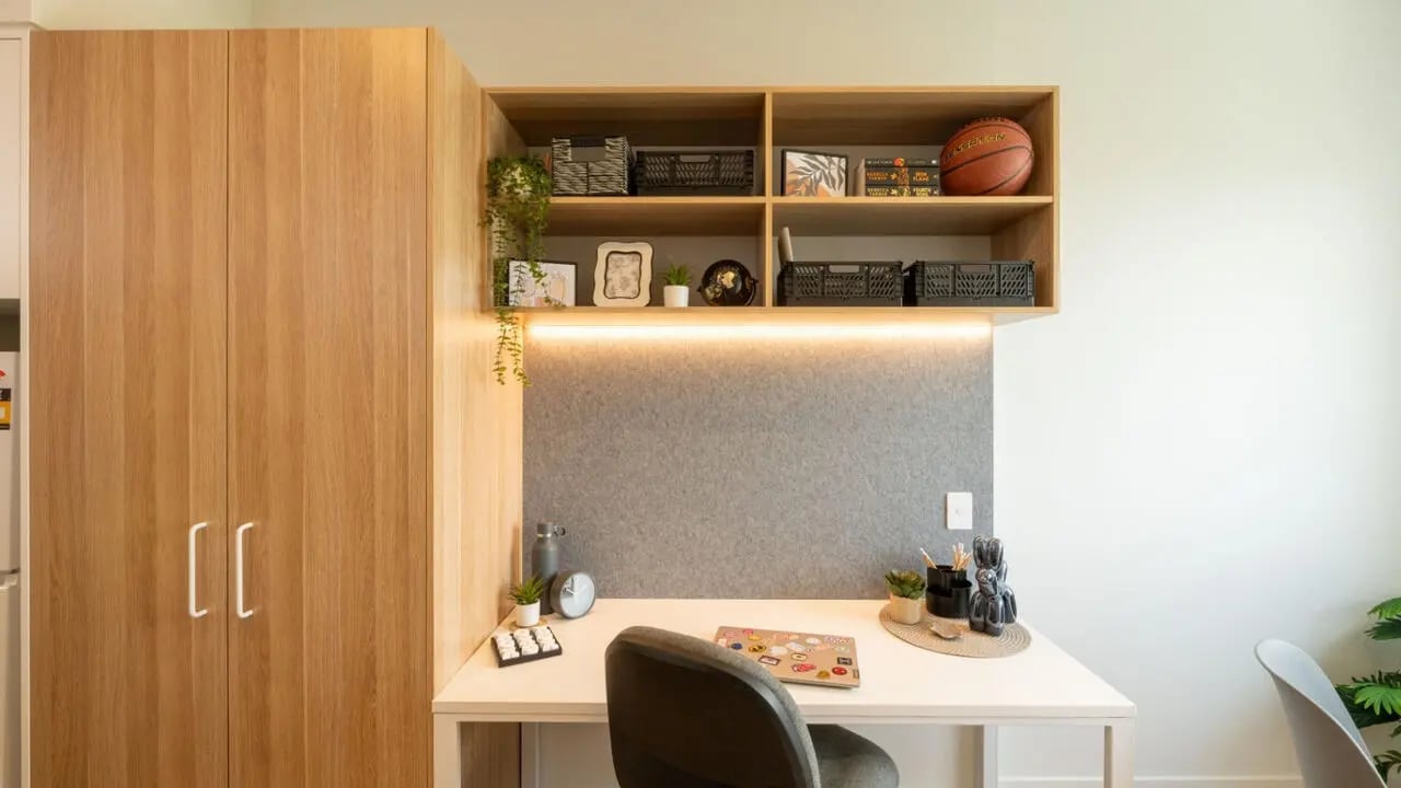 Wooden wardrobe desk with chair and shelves study area at UniLodge Brisbane City in Charleston Student Accommodation