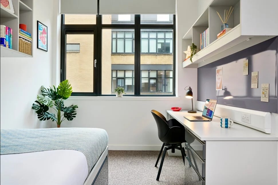 Bed desk chair laptop plant window study room at Clifton & Stewart House in Glasgow Student Accommodation