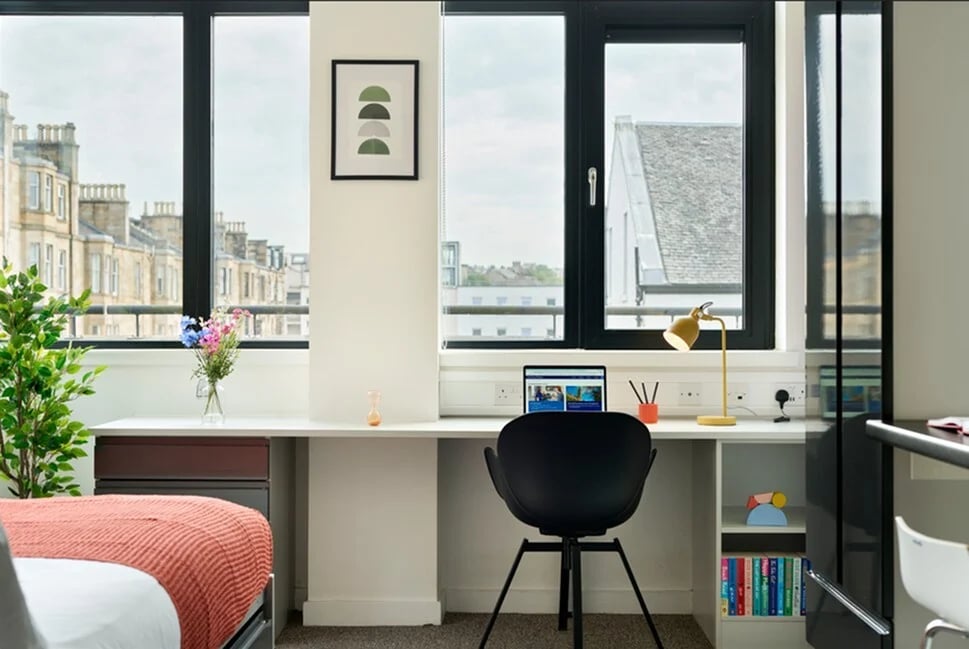 Desk with laptop and chair Study area at Clifton & Stewart House in Glasgow Student Accommodation