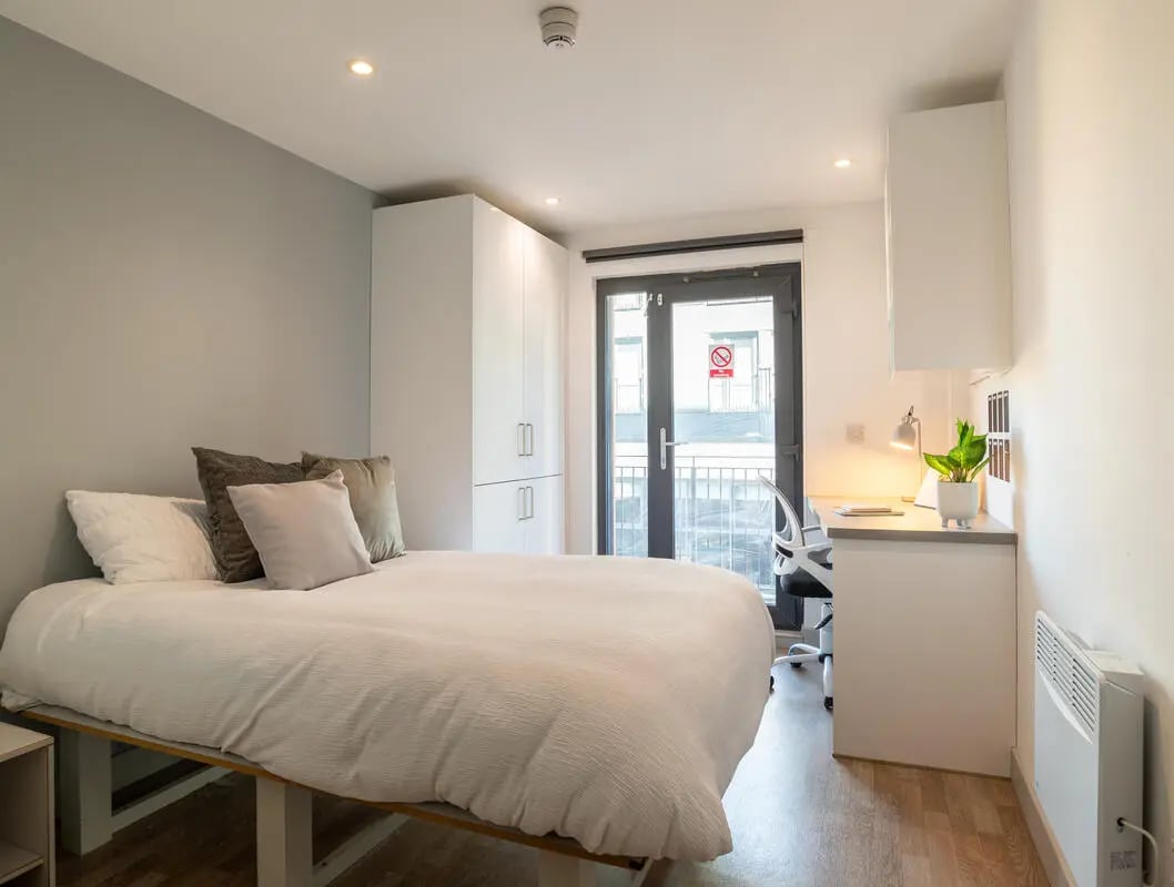 Bed desk and wardrobe bedroom at The Bridge Phase II in Newcastle Upon Tyne Student Accommodation