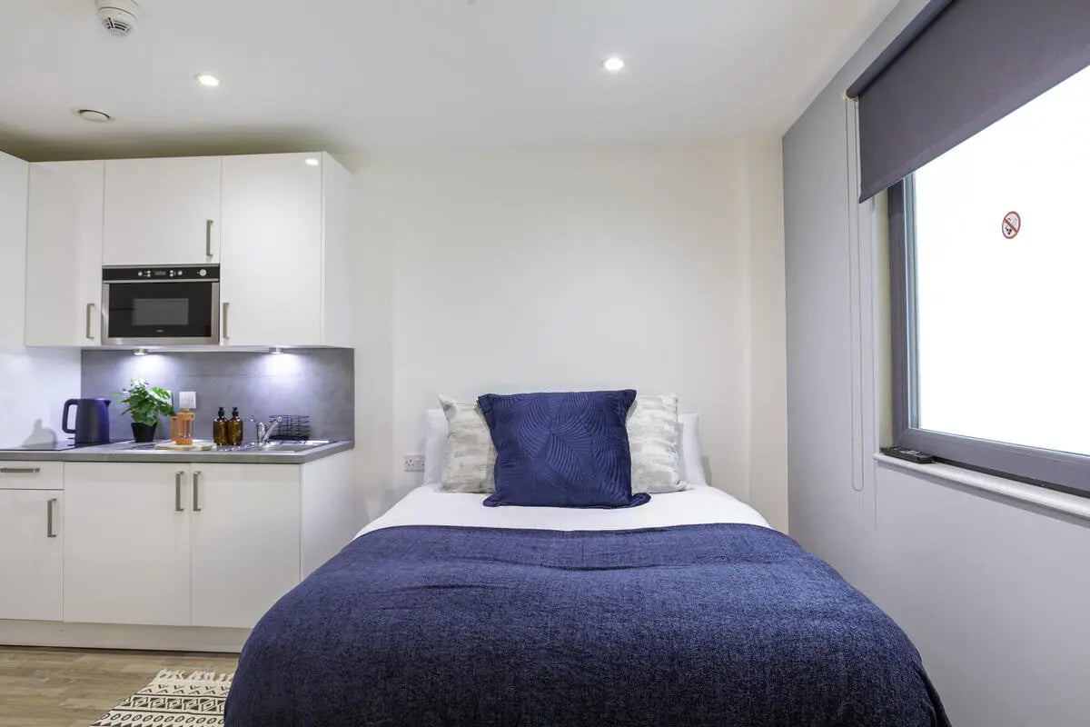 Bed kitchen area with microwave and kettle Bedroom at The Bridge Phase II in Newcastle Upon Tyne Student Accommodation