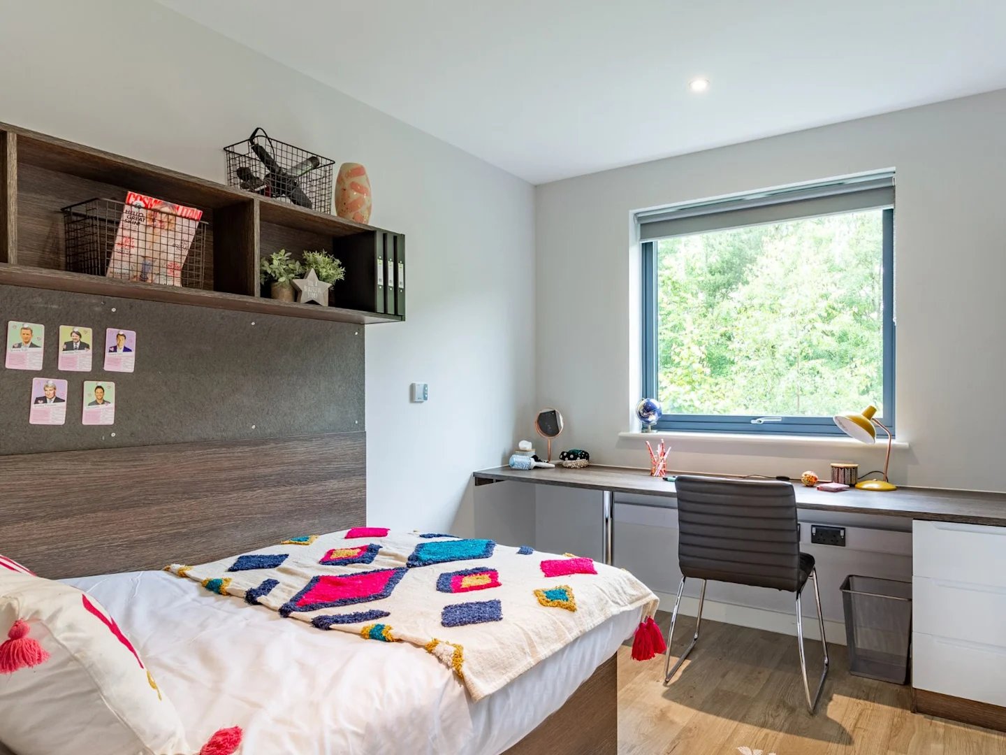 Bed desk shelves with storage and a chair Bedroom at Cricket Field Court in Exeter Student Accommodation
