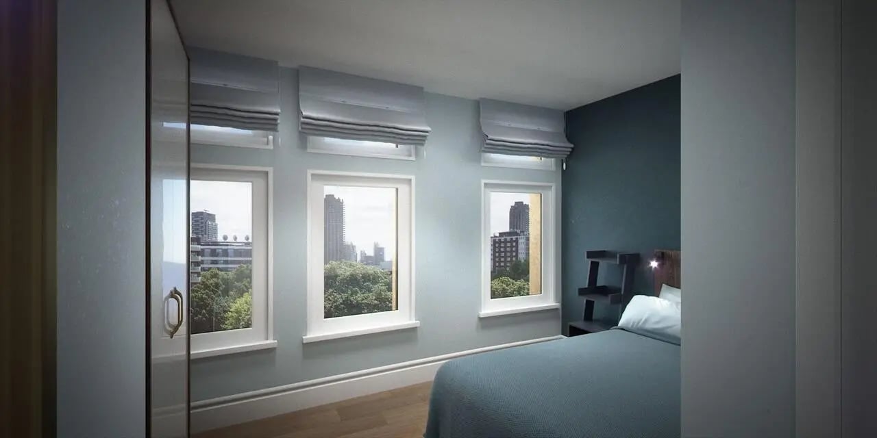 Bed and shelves with city view bedroom at Chamberlain Place in Birmingham Student Accommodation