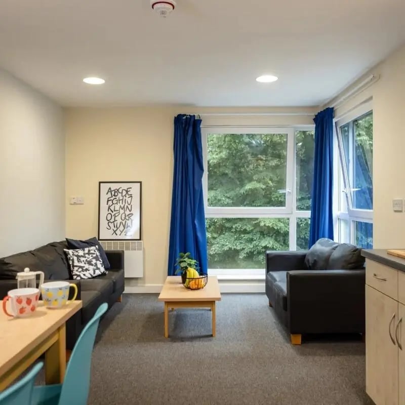 Two sofas coffee table mugs living room interior at Bonington Student Village in Loughborough Student Accommodation