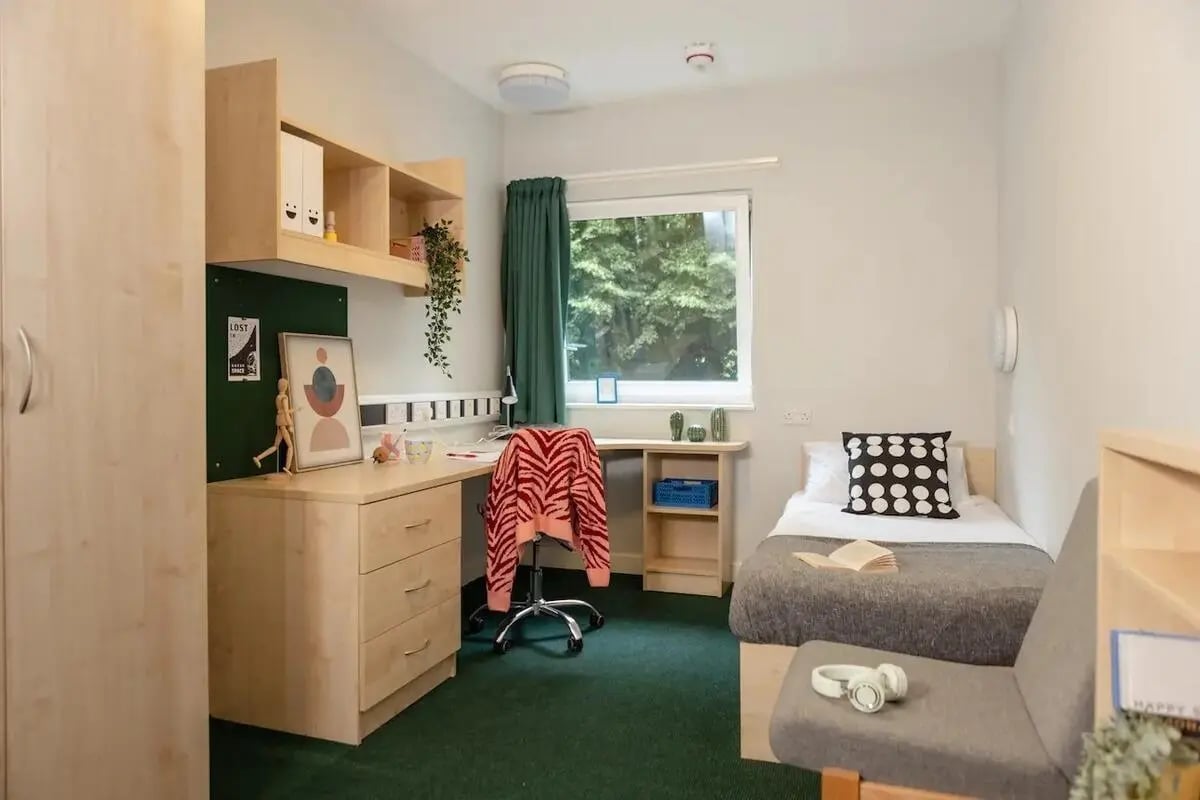 Desk bed chair and shelves student bedroom at Bonington Student Village in Loughborough Student Accommodation