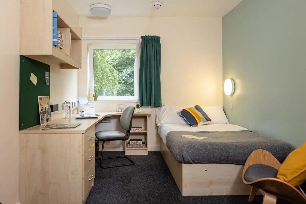 Desk bed chair and shelf student bedroom at Bonington Student Village in Loughborough Student Accommodation