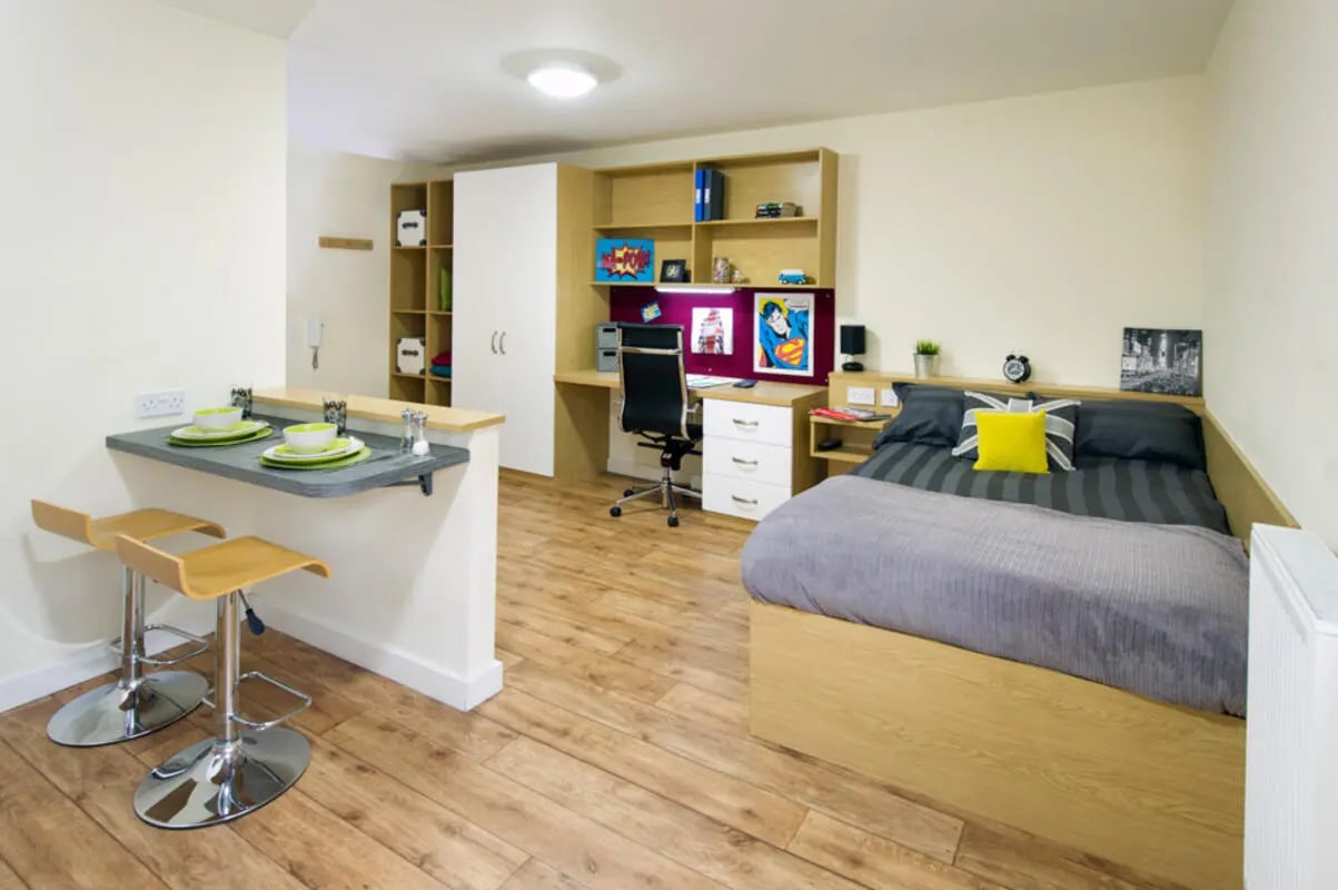 Bed desk dining area and storage student studio at Quebec House in Kingston Upon Thames Student Accommodation