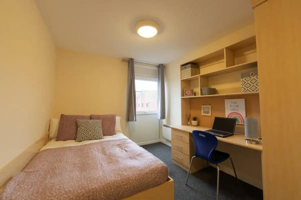 Bed desk laptop shelves chair bedroom at Brayford Quay in Lincoln Student Accommodation