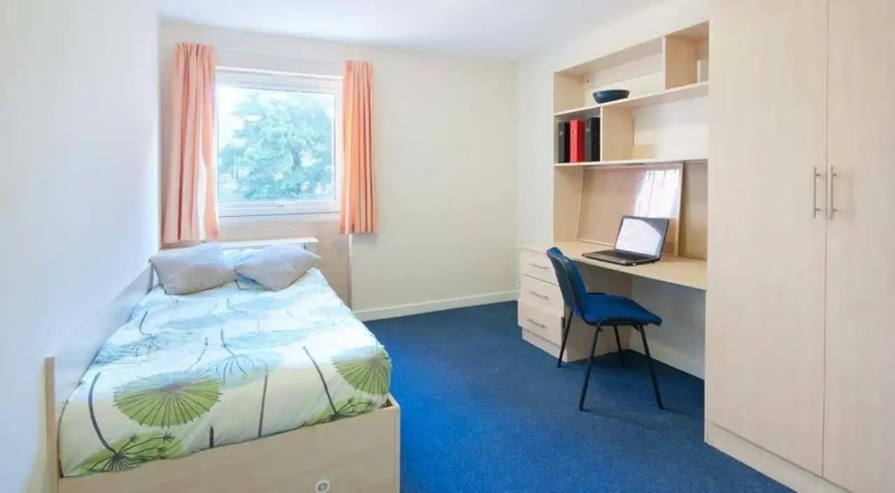 Bed desk and wardrobe bedroom interior at Brayford Quay in Lincoln Student Accommodation