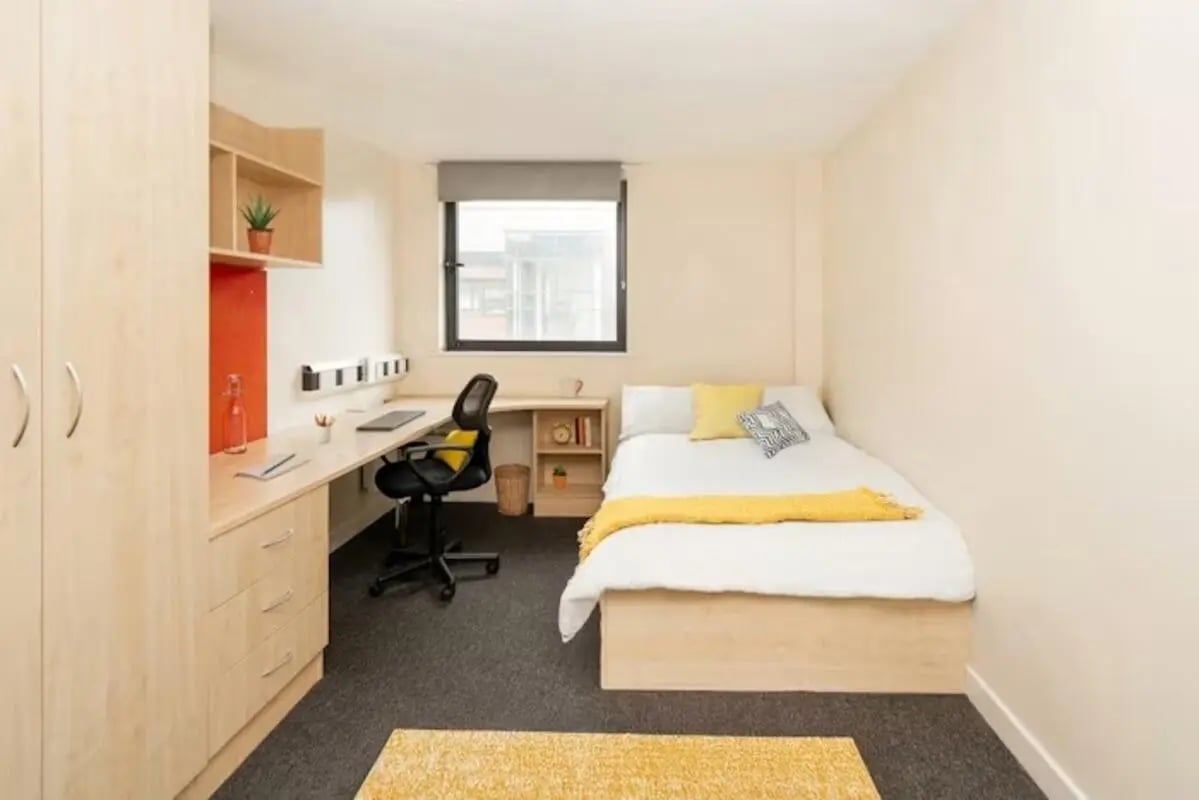 Bed desk closet and shelf student room at Sheffield 3 in Sheffield Student Accommodation