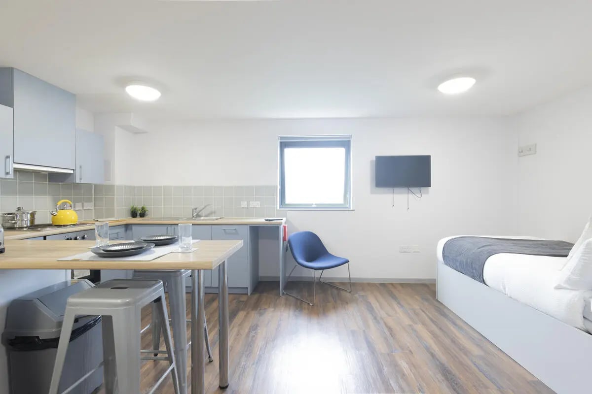 Kitchen diner with bed and TV bedroom at Newton Court in Newcastle Upon Tyne Student Accommodation