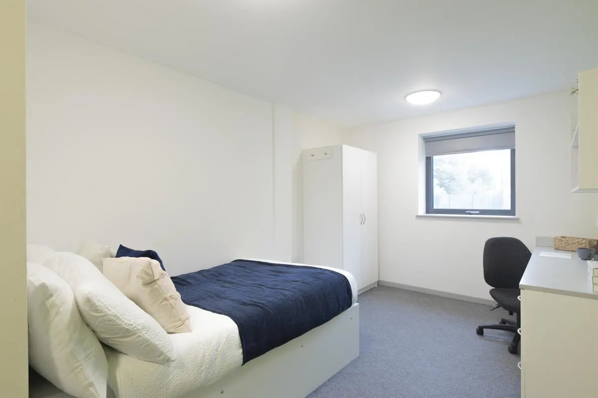 Bed closet desk chair window bedroom at Marshall Court in Newcastle Upon Tyne Student Accommodation