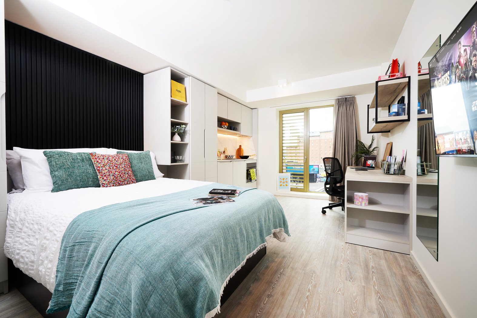 Bed kitchen study area and desk bedroom at Vita Student Bruce Street in Belfast Student Accommodation