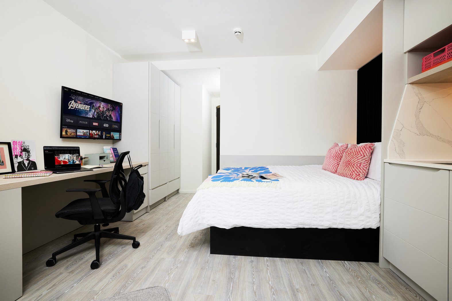 Bed desk chair television and wardrobe bedroom at Vita Student Bruce Street in Belfast Student Accommodation