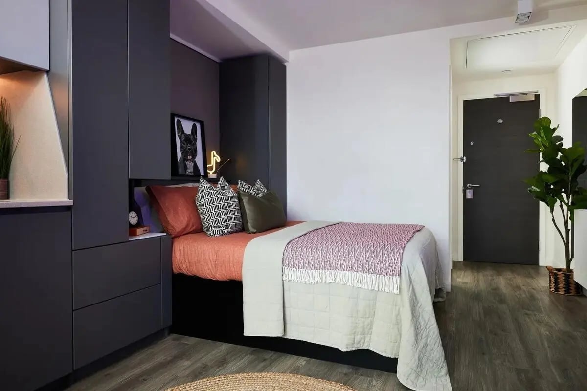 Bed dog picture neon light modern bedroom. at Vita Student Manchester Circle Square in Manchester Student Accommodation