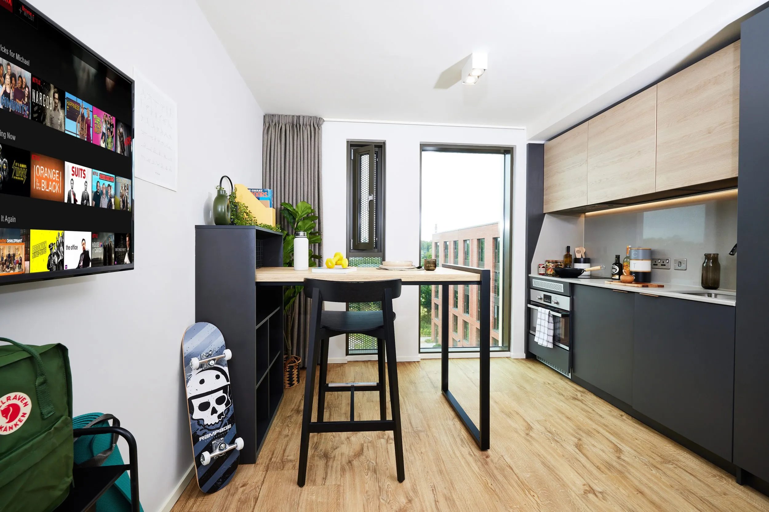 Modern kitchen with dining area and living space. at Vita Student Pebble Mill in Birmingham Student Accommodation