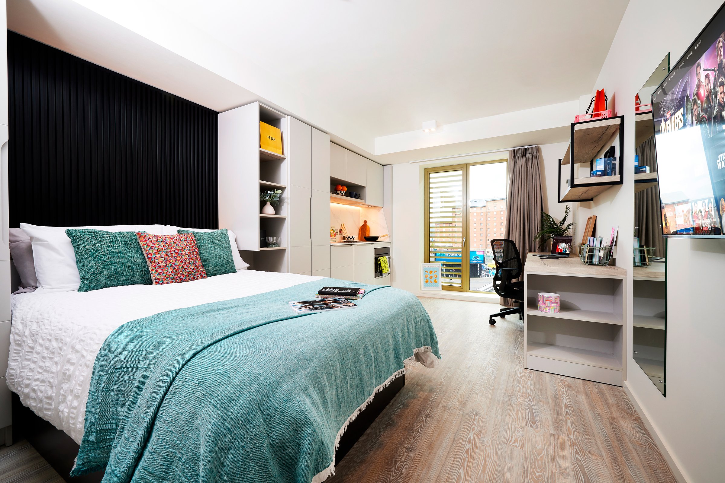Bed kitchen desk and TV living room at Vita Student New Waverley in Edinburgh Student Accommodation