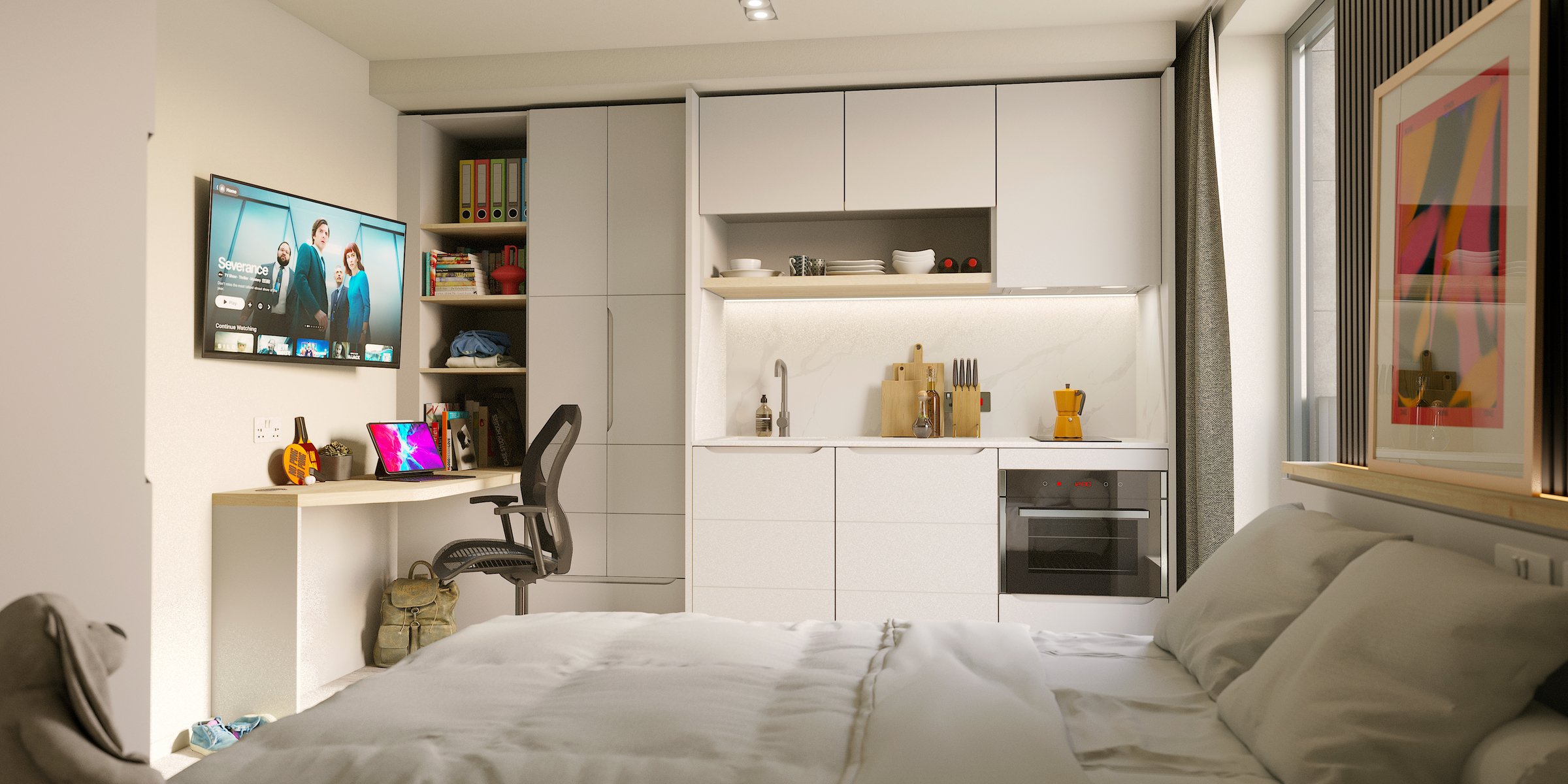 Bed desk TV kitchen and shelves living room at Vita Student New Waverley in Edinburgh Student Accommodation