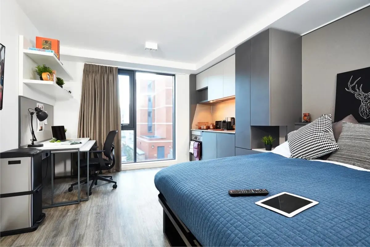 Bed desk and kitchen area Studio at Vita Student Fountainbridge - Edinburgh in Edinburgh Student Accommodation