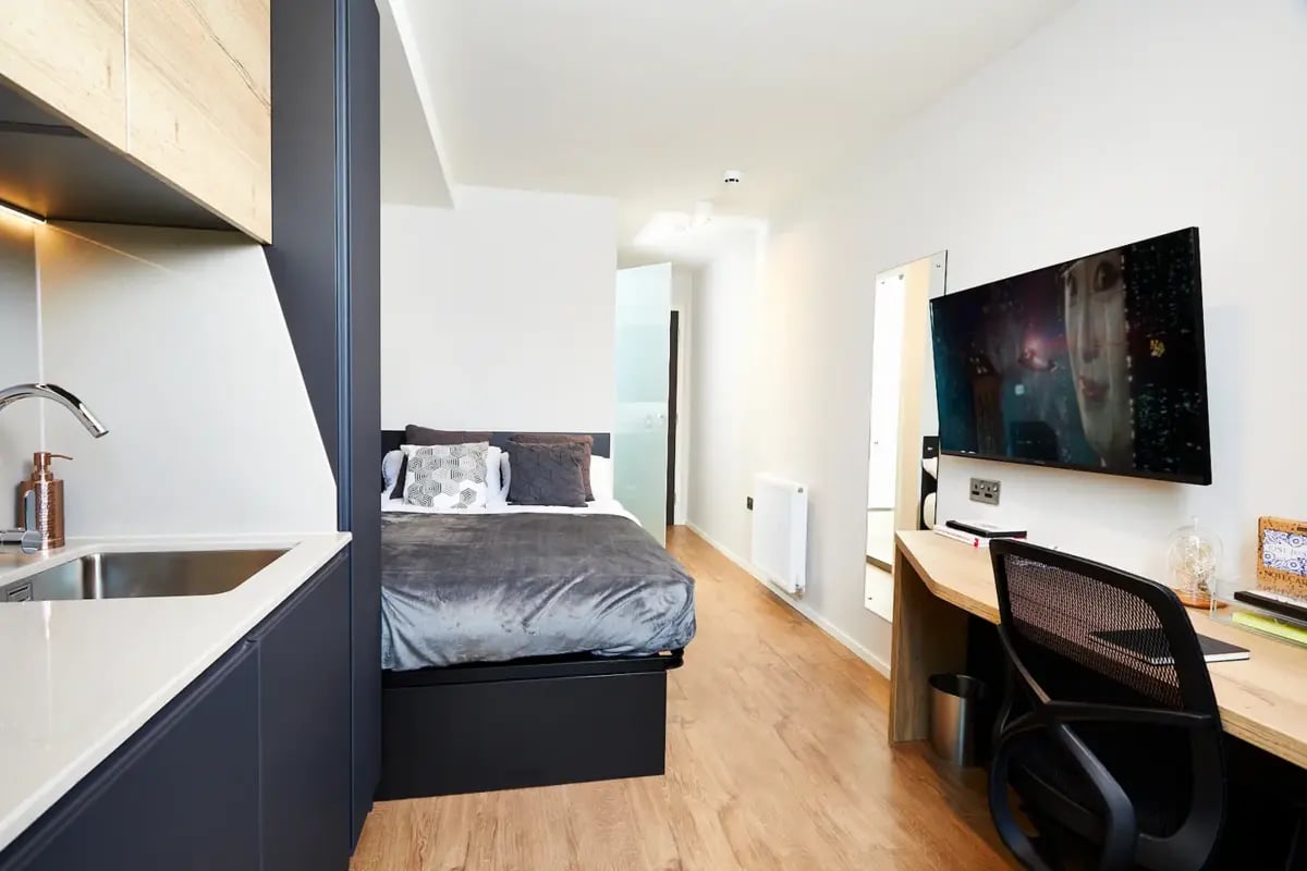Kitchen sink bed desk and TV bedroom at Vita Student Station Street in Nottingham Student Accommodation