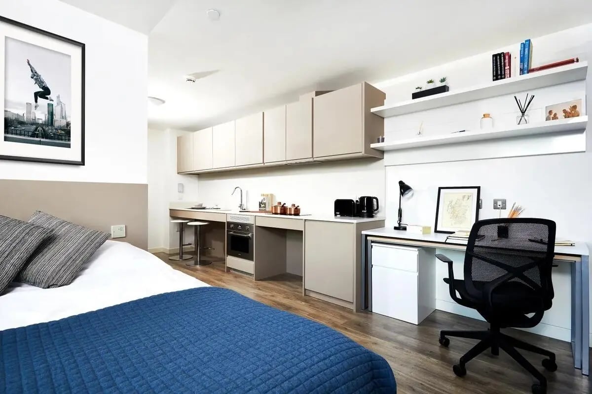 Bed kitchen desk and chair studio at Vita Student West End - Glasgow in Glasgow Student Accommodation