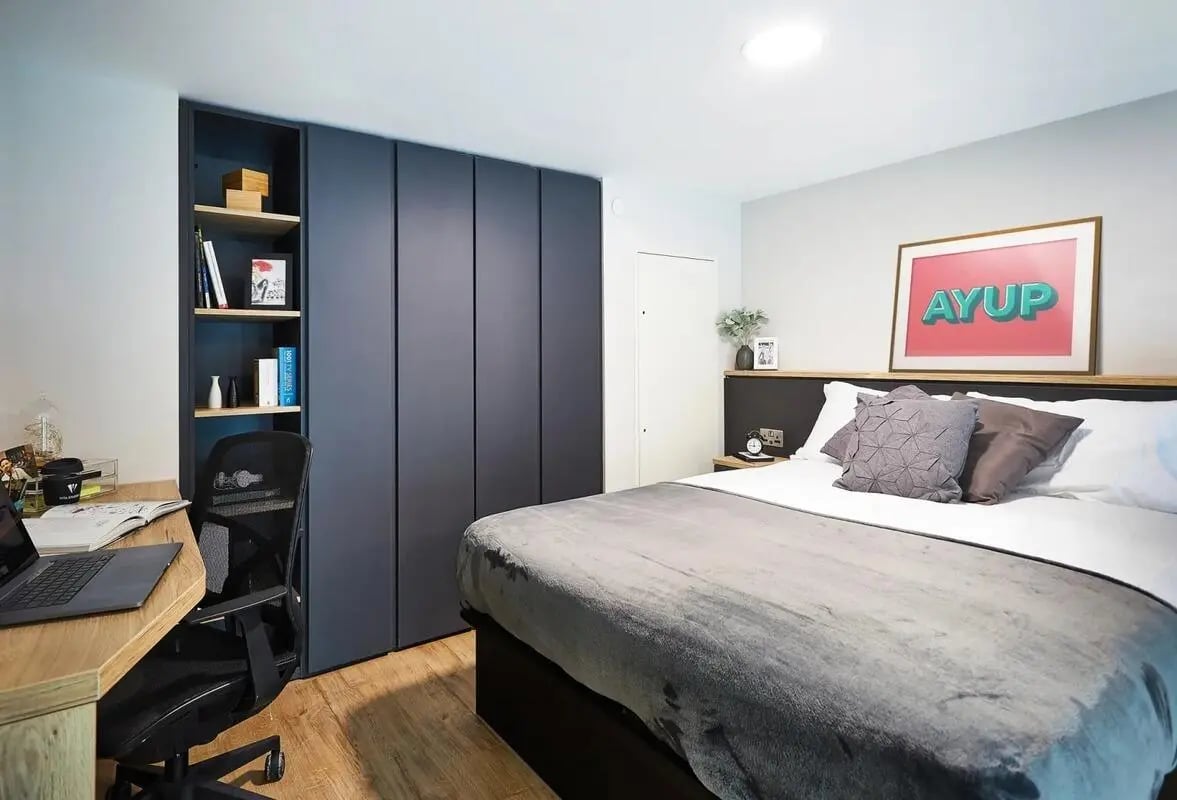 Bed desk and wardrobe student accommodation bedroom at Vita Student Portland Crescent in Leeds Student Accommodation