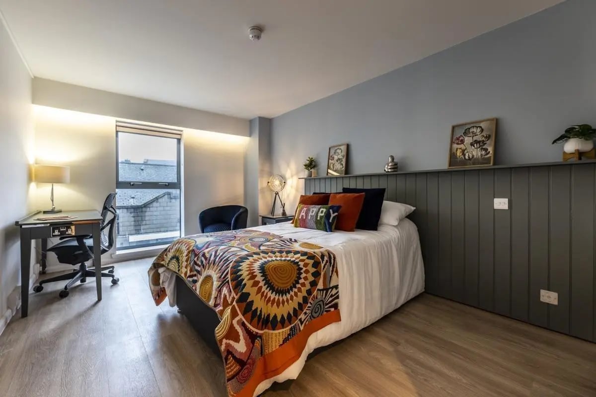 Bed desk chair and window bedroom at St. Andrew Street in Aberdeen Student Accommodation