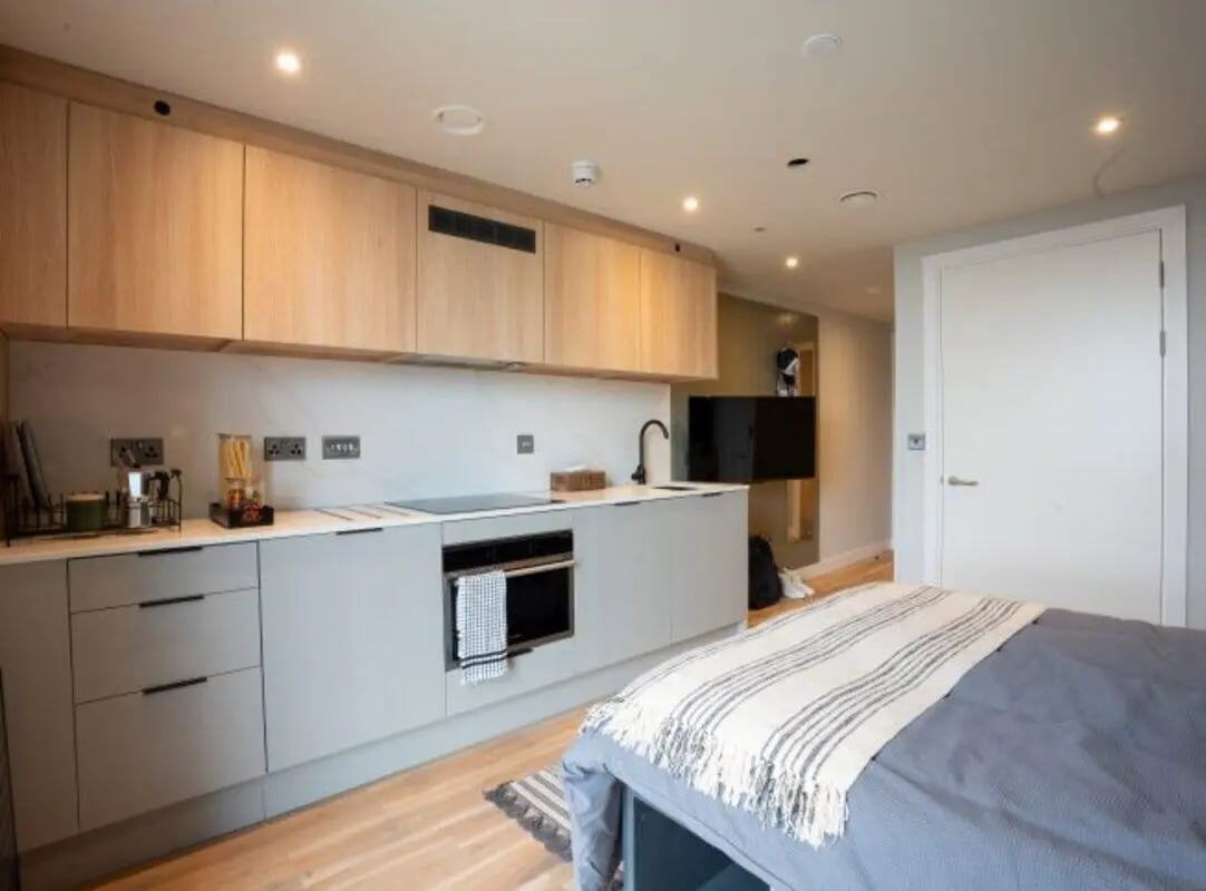 Bed kitchen cabinets and oven studio apartment at Fusion Students Brent Cross in London Student Accommodation