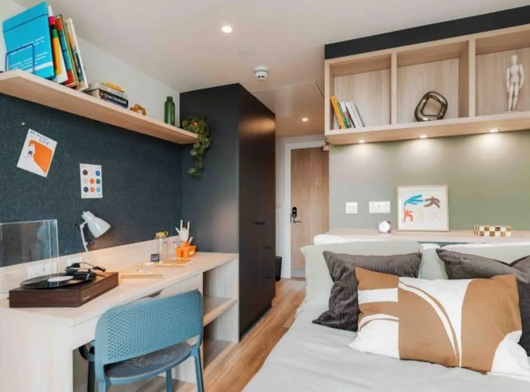 Desk, chair, bed, shelves, closet Bedroom at Fusion Manchester in Manchester Student Accommodation