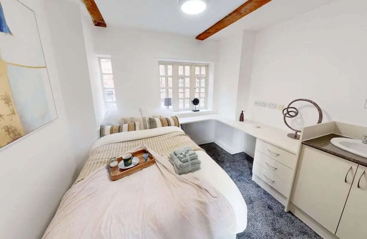Bed study desk sink and drawers bedroom at Truro Works in Sheffield Student Accommodation
