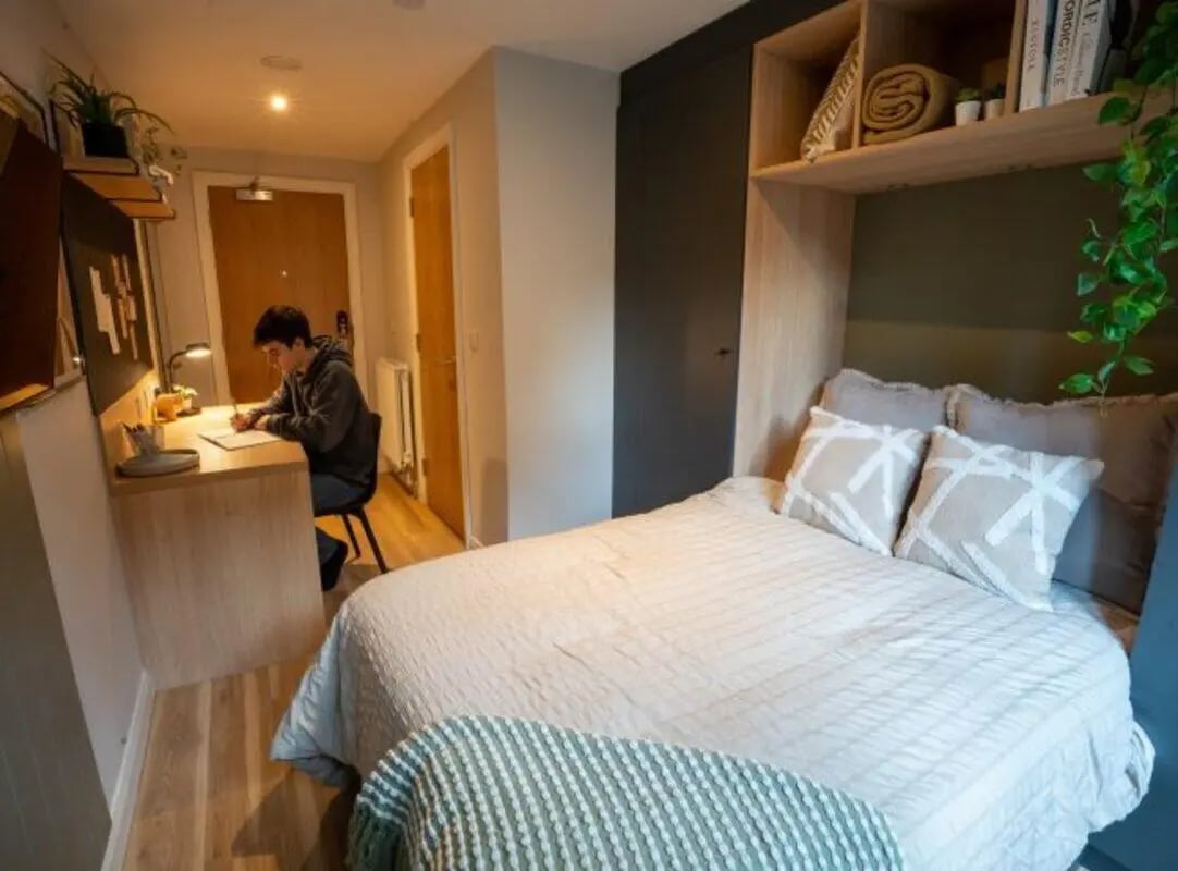 Student desk bed and shelves bedroom at Fusion Students Nottingham in Nottingham Student Accommodation