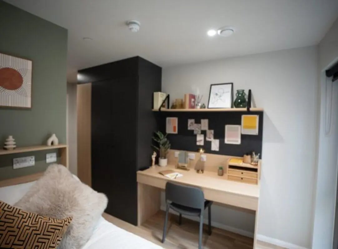Bed desk artwork and chair study area at Fusion Students York in York Student Accommodation
