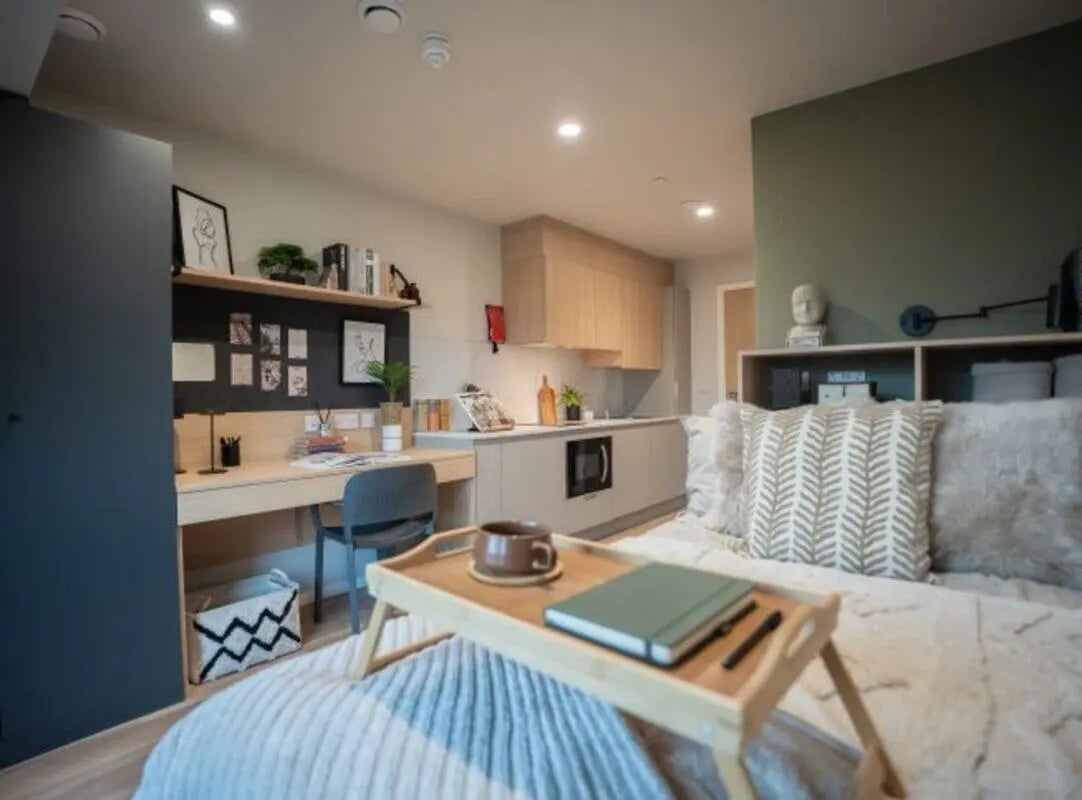 Desk kitchen bed and sofa studio apartment at Fusion Students York in York Student Accommodation