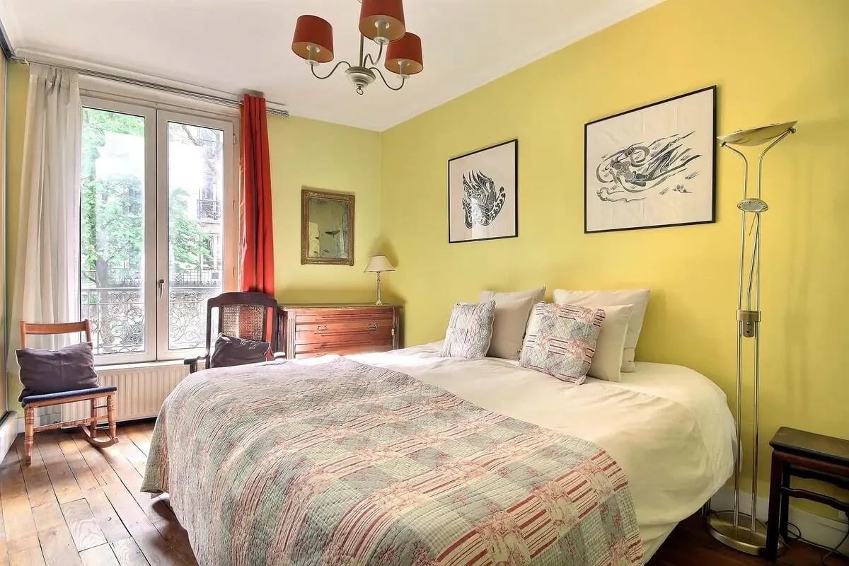 Bed dresser chair and window bedroom at Apartment in Rue Caulaincourt, 75018 Paris, France in Paris Student Accommodation