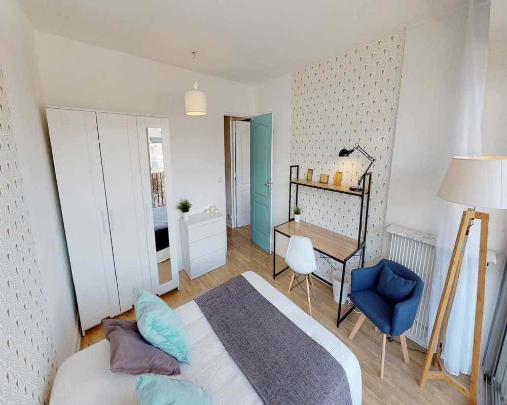 White wardrobe dresser desk chair and bed bedroom at Room in 33 Rue d'Hautpoul, 75019 Paris, France in Paris Student Accommodation