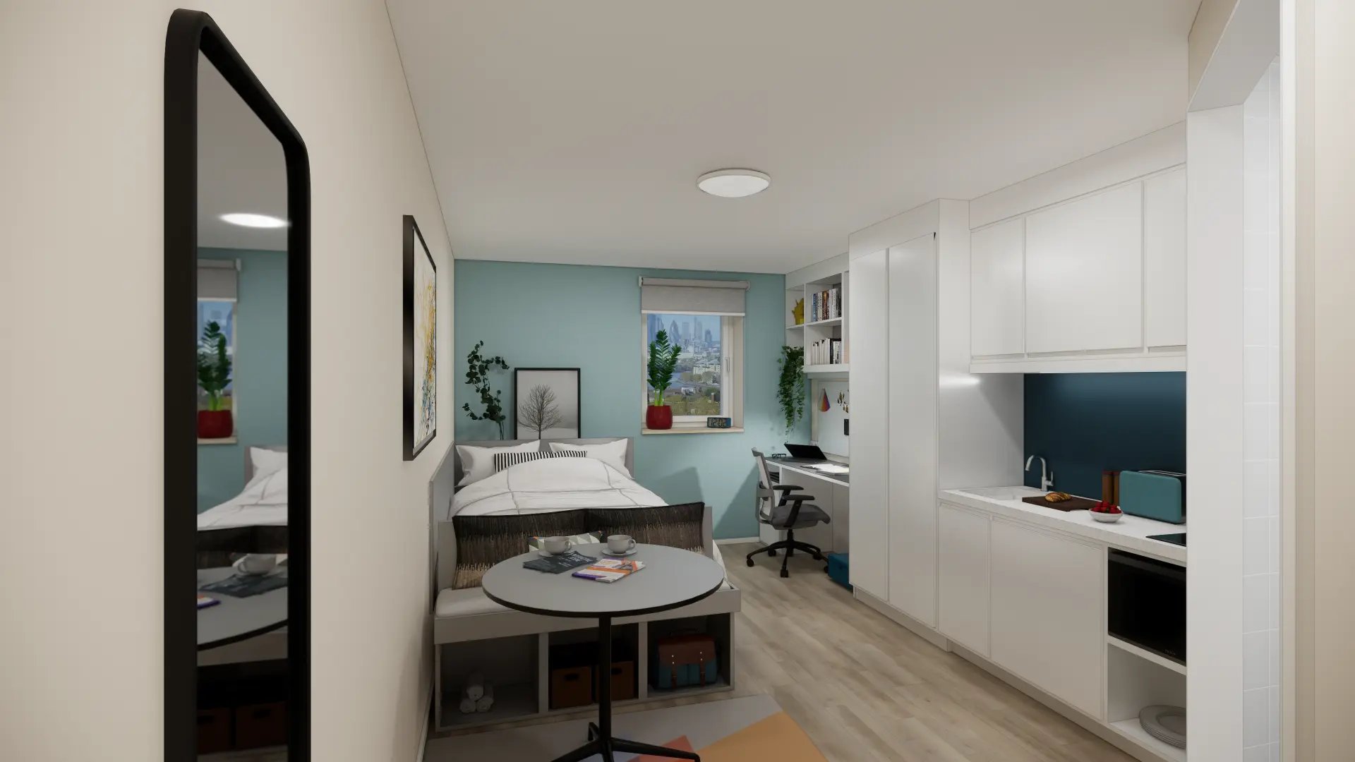 Bed desk kitchen and storage studio room at Mcmillan student Village in London Student Accommodation