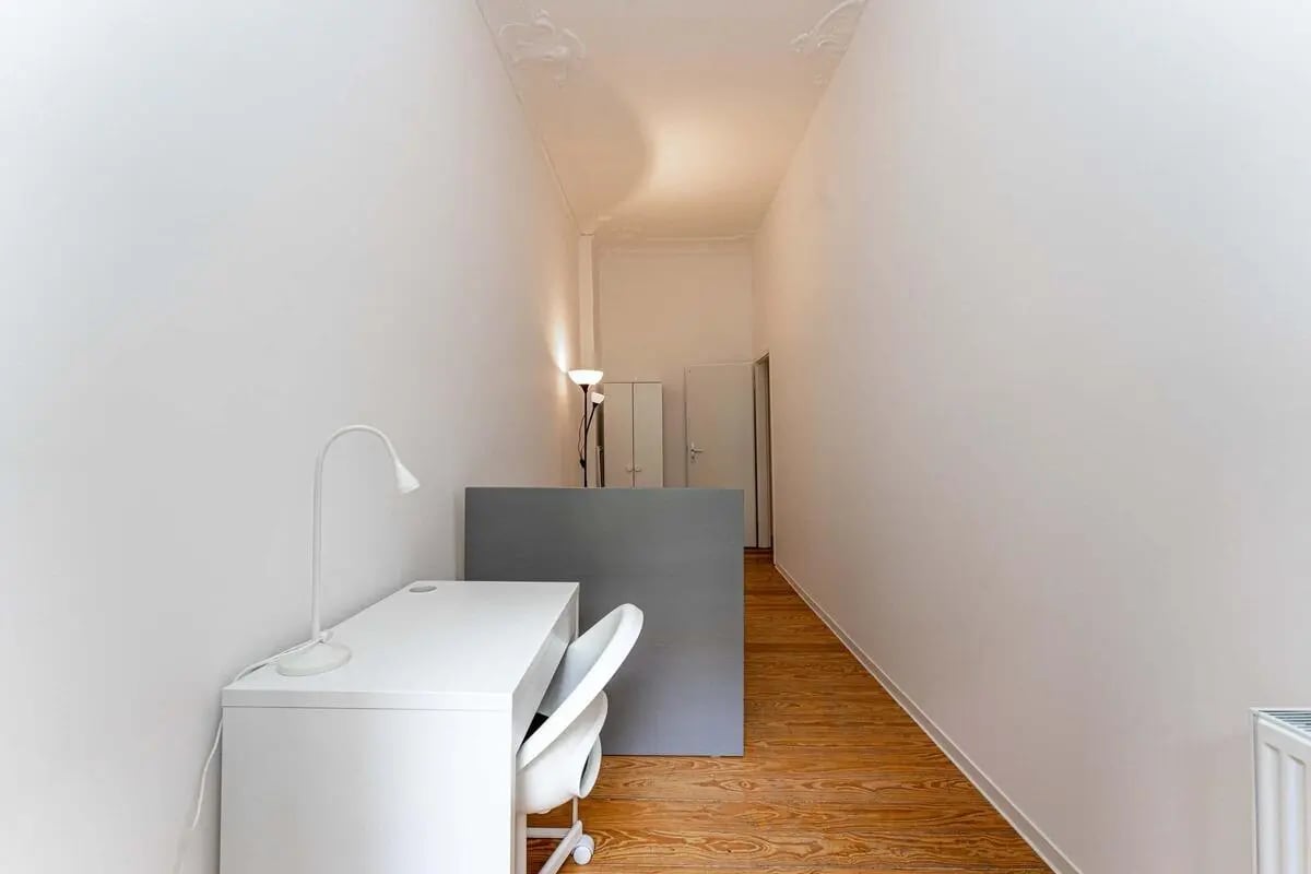 White desk with lamp chair study area at Gabriel-Max-Straße - Room 4 in Berlin Student Accommodation
