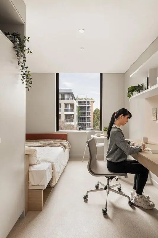 Bed desk chair and window bedroom at Iglu Mascot Duo in Sydney Student Accommodation
