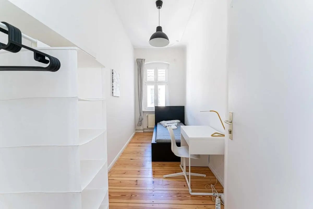 White shelves bed desk chair window bedroom at Wühlischstraße - Room 3 in Berlin Student Accommodation