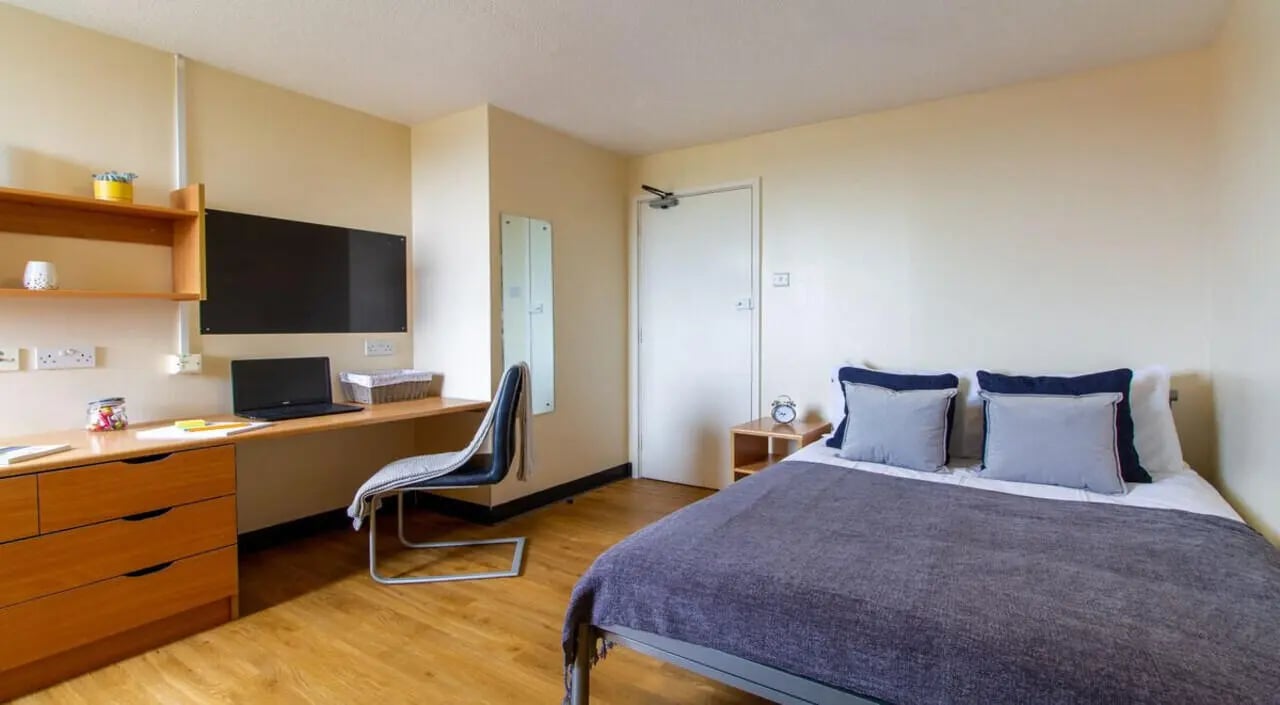 Bed desk chair and dresser bedroom at Ben Russell Court in Leicester Student Accommodation